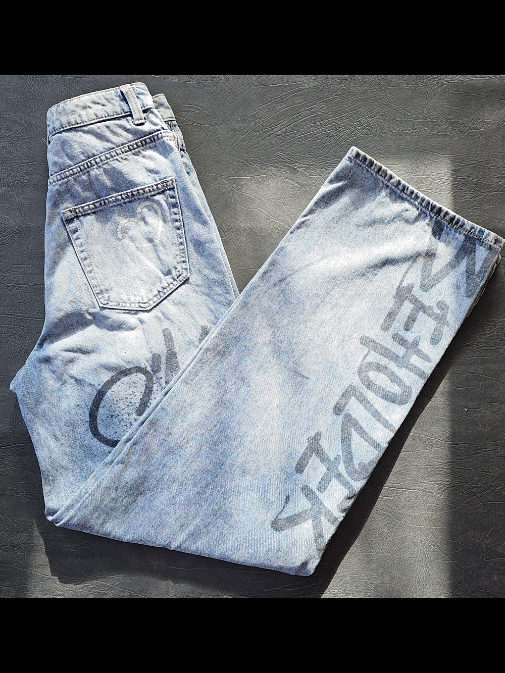 H&M Divided Graffiti High Rise Wide Leg Jeans Light Denim Wash 
Womens Size 2